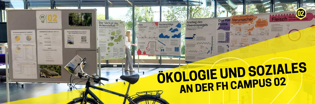 Fahrrad und Plakate zu Nachhaltigkeit in der Aula der FH CAMPUS 02