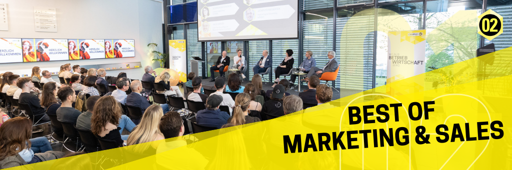 Publikum und Diskussionsrunde auf der Bühne bei Best of Marketing und Sales